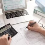 Logotipo de grupo de Impuestos, Contabilidad y Nominas